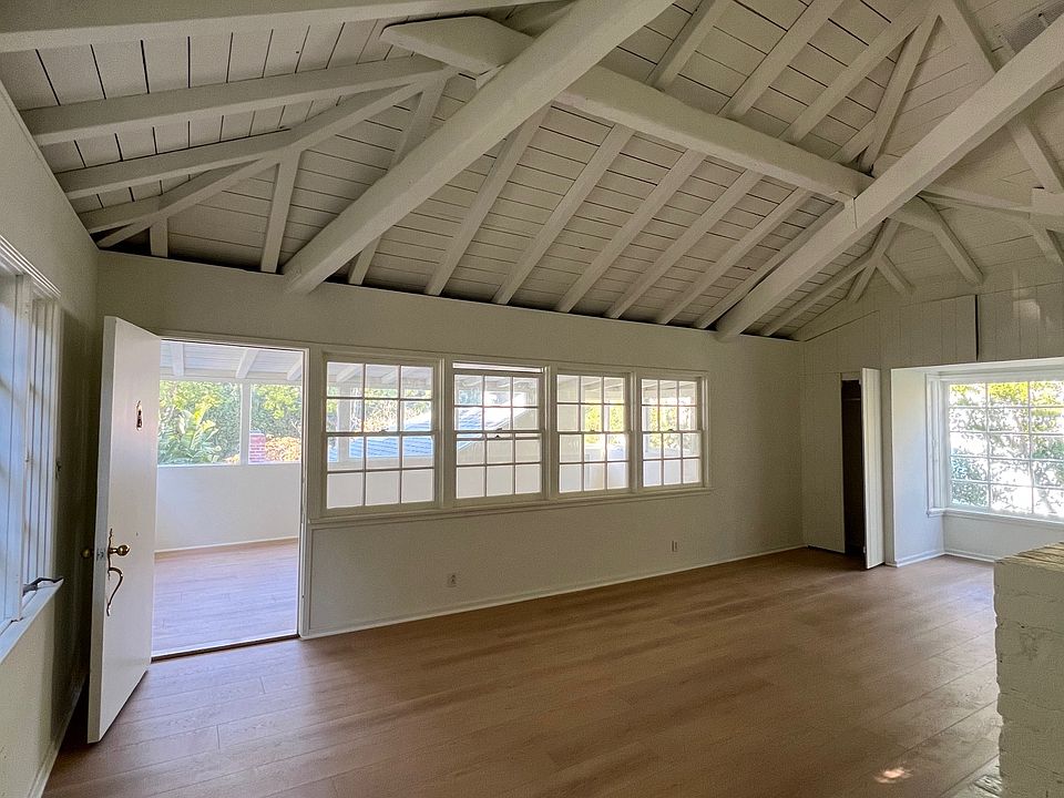High Ceiling Living Room with lots of Natural Light