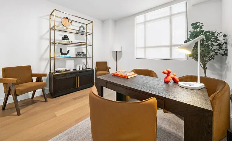Sky Residence D office space, elegantly furnished with Restoration Hardware pieces.