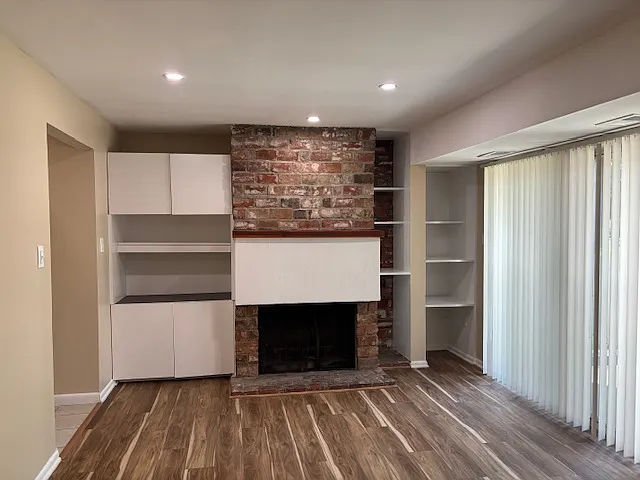 Close up view of wood burning fireplace.