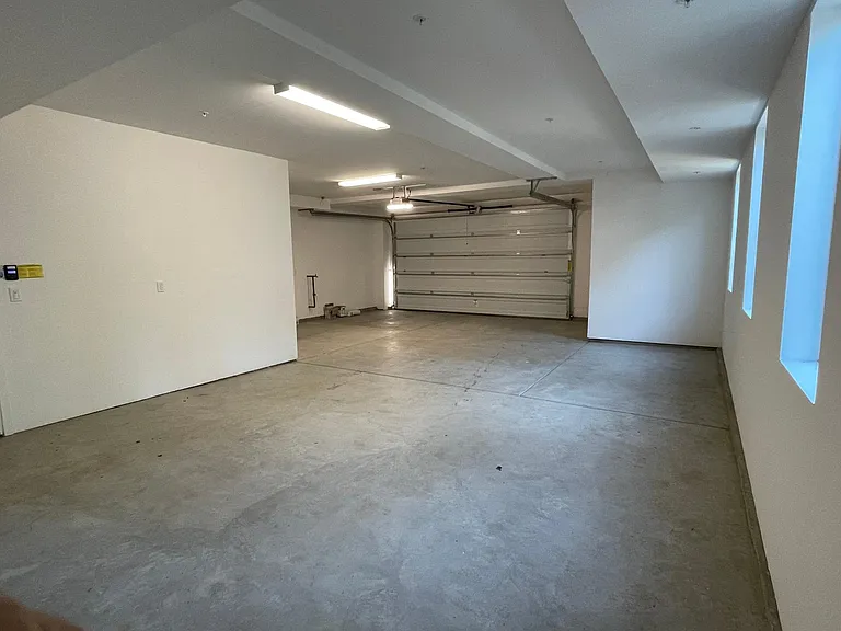 Over-sized garage (for up to 4 cars) or use as extra storage space