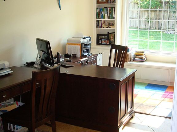 Offfice w/ travertine tiles and built-Ins