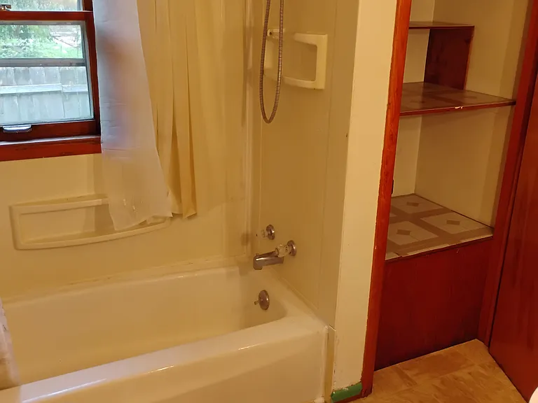 bath/shower and large linen closet