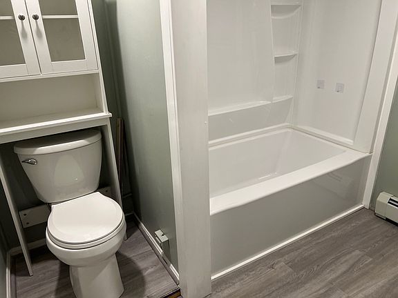 This photo is from another unit in the building. This unit will be of a similar quality and style.