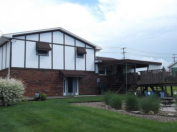 Rear of home : New upper windows and new doors