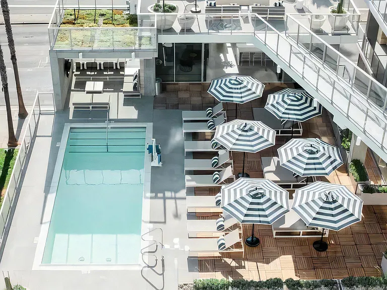 Patio with Swimming Pool and Chaise Loungers