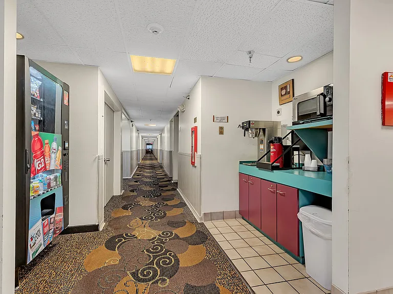 Convenient coffee & laundry room available for residents.