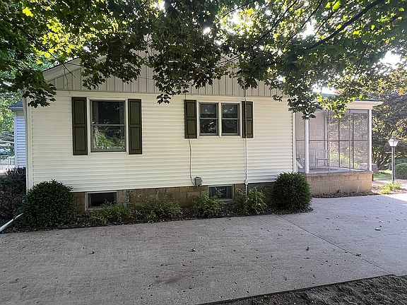 side of house with concrete 