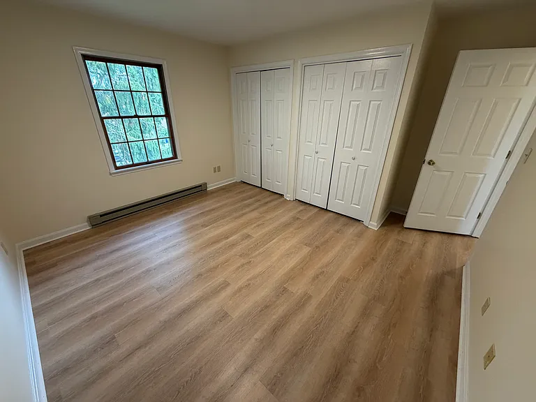 Upstairs features brand new luxury plank flooring in bedrooms and hallway. Primary bedroom boasts two large closets