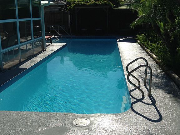Newly resurfaced pool and de