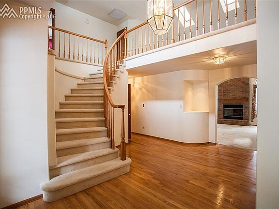 Open foyer with beautiful hardwood floors.
