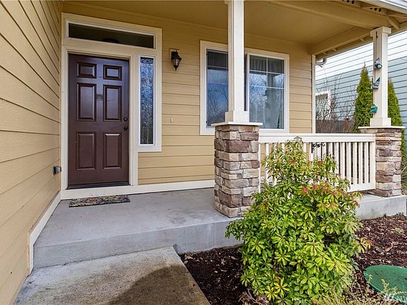 Oversized covered porch greets you at the front door.