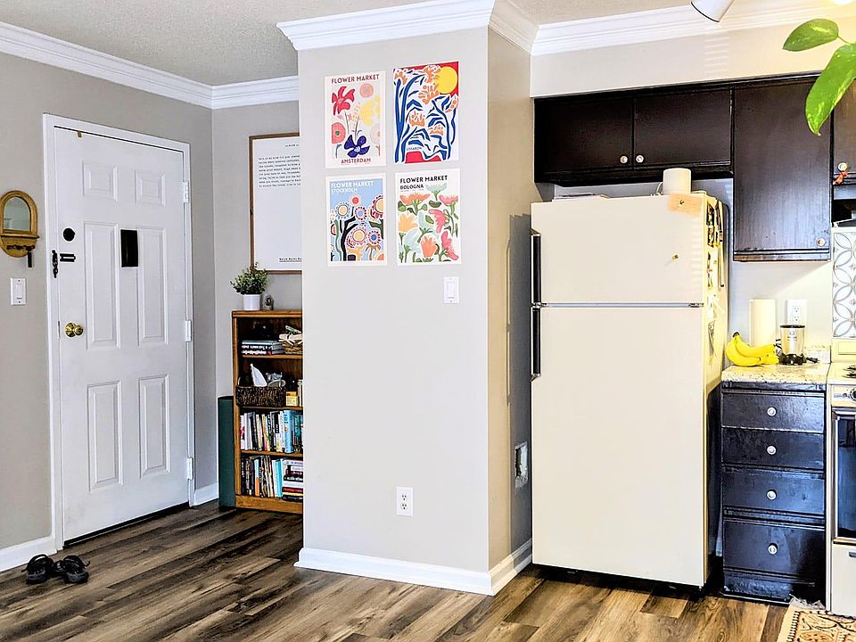 Entrance with coat closet across from door. All new paint.