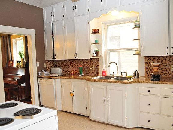Spacious Kitchen with Dishwasher, Refrigerator, Stove and Ga