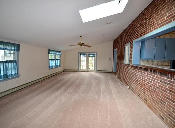 Adjacent family room addition with skylights!