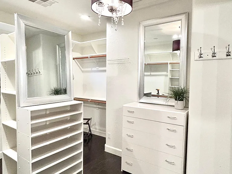Upstairs master bedroom walk in closet