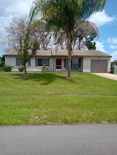 409 SE Jupiter Ter Photo 1