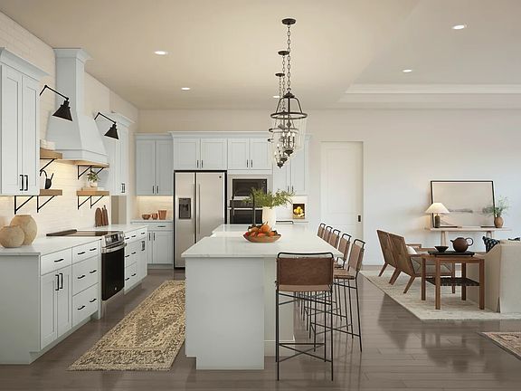 Kitchen with pendant lighting over spacious island