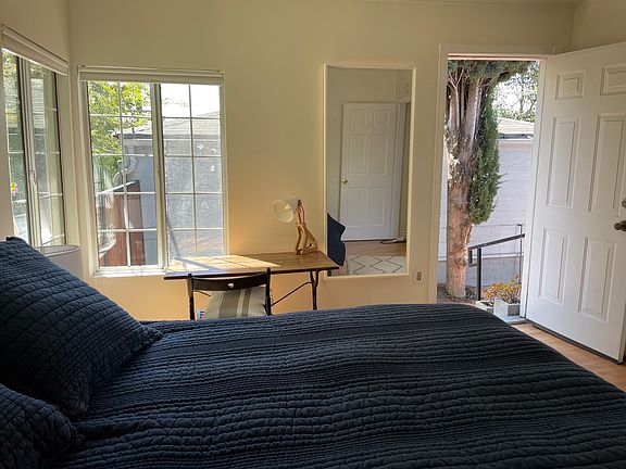 The First bedroom opens on the garden.