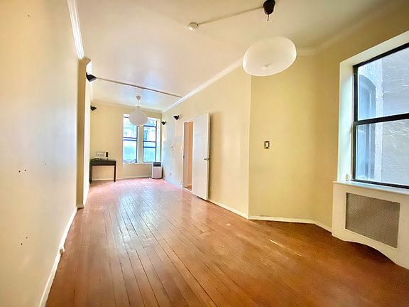 2nd image of 224 E 11th St APT 1