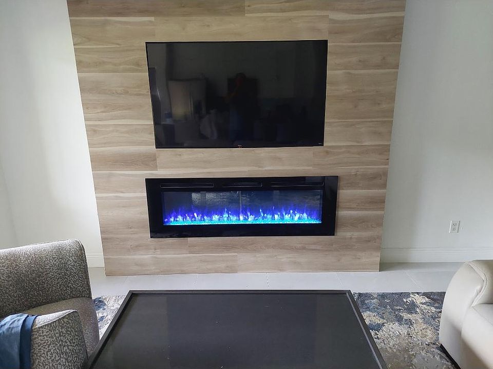 New TV area, Electric fire place, very relaxing living room.