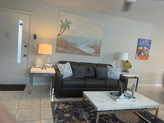 living room w leather queen sofa bed !