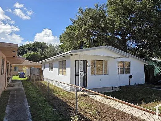 5560 NW 7th Ct — Photo 3