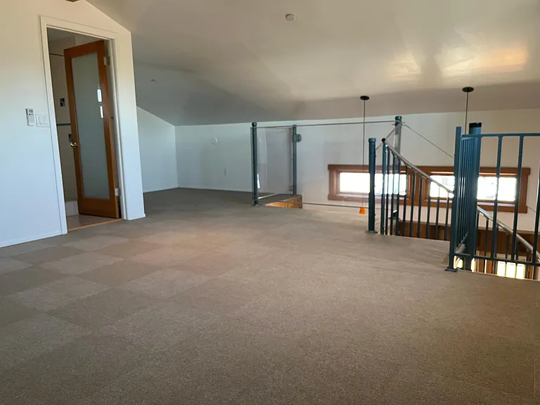 Upstairs mezzanine which can be used as a bedroom