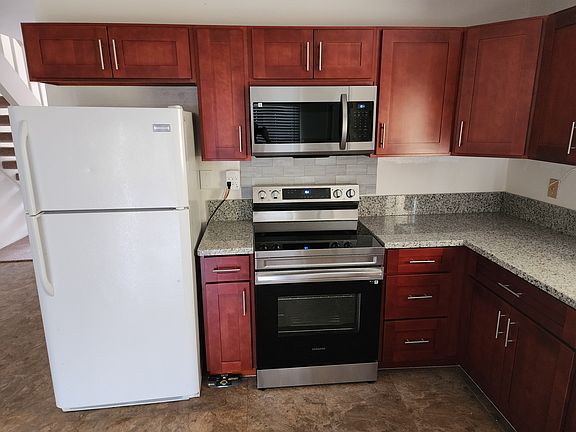 New stove/oven range and microwave fan.