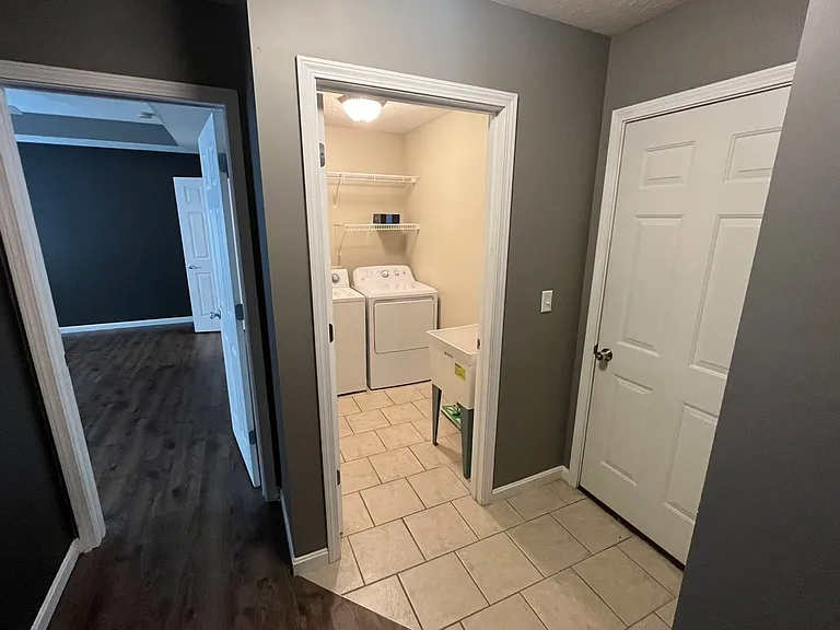 Left: Master Bedroom. Middle: Laundry Room. Right: Garage Door