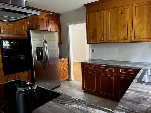 Kitchen with pocket door to dining room