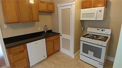 High End Cabinets, Granite Counter-tops, Brand New Dishwasher & Stove!