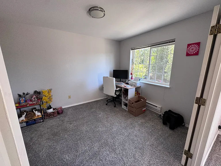 Den that can function as a home office or third bedroom