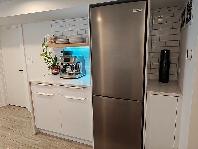 Refrigerator and more storage space. Nest thermostat.