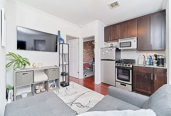 1st image of 504 E 12th St APT 13
