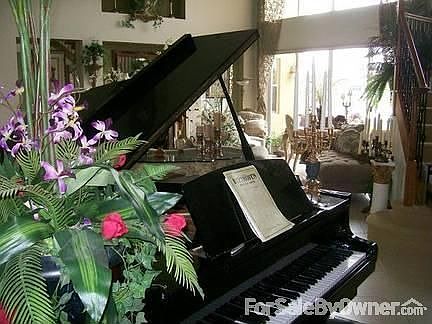 Grand Piano : Beautiful Ebony Grand Piano between Living Room and Formal Dining Room