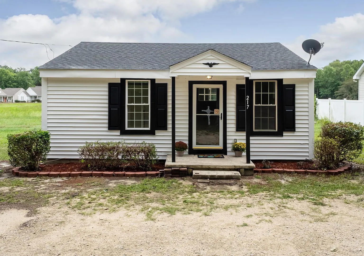 Updated Three Bedroom Home with Detached Garage! — Photo 1