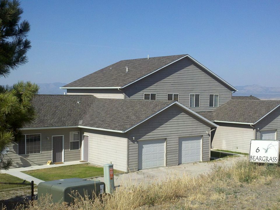 6 Beargrass Rd. This 4-plex townhouse is private and accomodating to families. The two end townhouses are 2-bedroom 1-bath single level. The two inside townhouses are 3-bedroom 2-story with 2 bathrooms. Each unit has their own single car garage. Laund