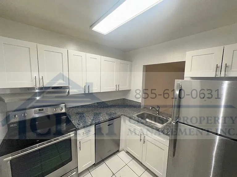 Colonial Village - 7550 Stirling Rd — Photo 17
