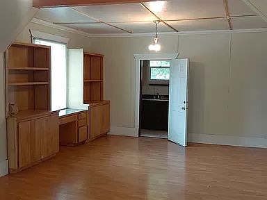 Unit C dining room. Main level bathroom and laundry room.