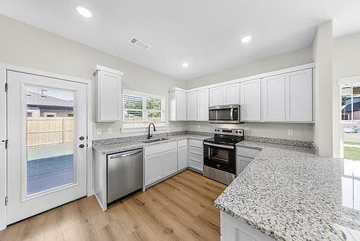 1st image of 601 Cosmos St