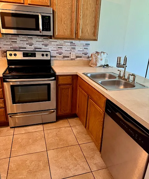 Kitchen with dishwasher.