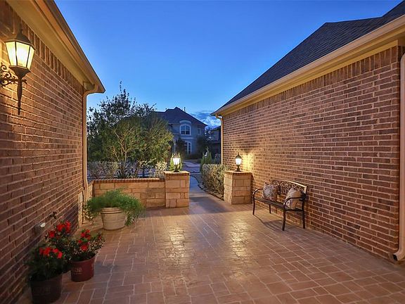 Even looking from the front door out to the street, the lantern style lighting makes for a great ambience and setting! Plenty of room for more seating if desired.