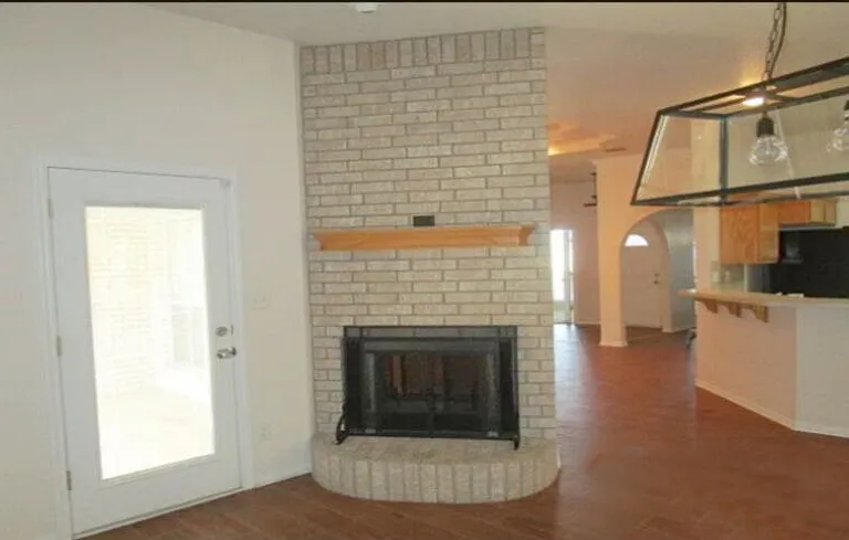 Pass through fireplace between family room and living room.