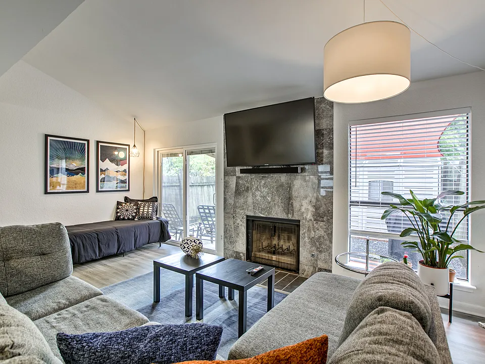Open living area with direct access to private backyard
