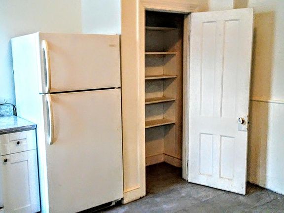 Gas stove and huge pantry.