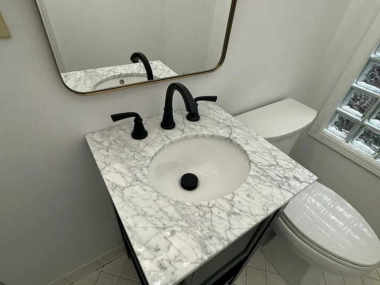 Brand new vanity, mirror, and lighting