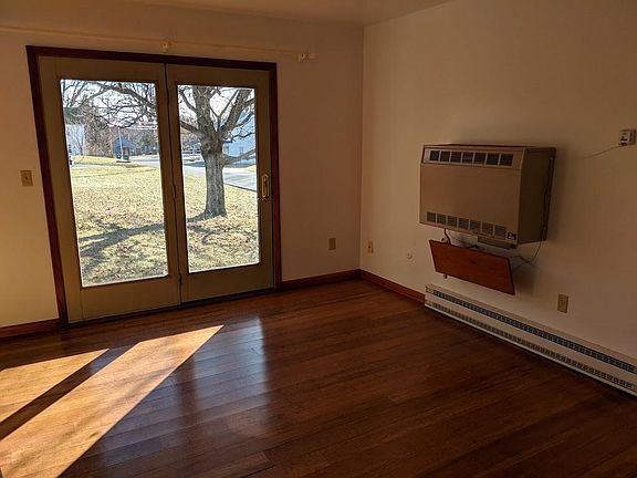 Dining/Living area with sliding glass door to outside