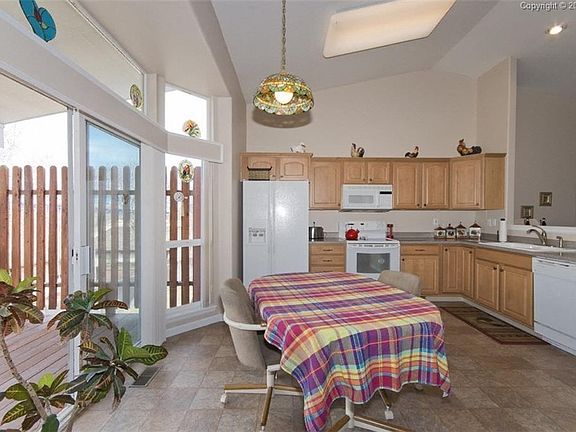 Country Kitchen & Walk-out to Covered Deck