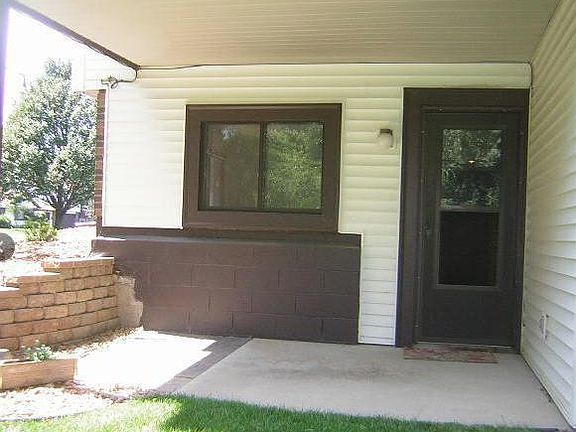 Lower level walkout to private patio from home office/den