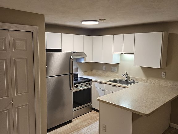 Kitchen with new cabinets.
Stainless steel appliances: stove, refridgerator, dishwasher, garbage disposal
Washer & dryer in unit